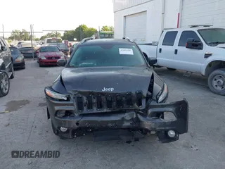 2014 Jeep Cherokee Limited z VIN 1C4PJLDS4EW238513, wystawiony jako IAAI lot #42093200 z przebiegiem 77 007 mil mil oraz . Historia ofert i sprzedaży dostępna na DreamBid. Obrazek 12.