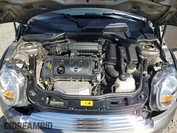 2013 MINI Hardtop with VIN WMWSU3C57DT678736, listed as a Copart auction lot 52586285 with 64,563 mi miles and Salvage Title. Bid and sale history available at DreamBid. Image 11.