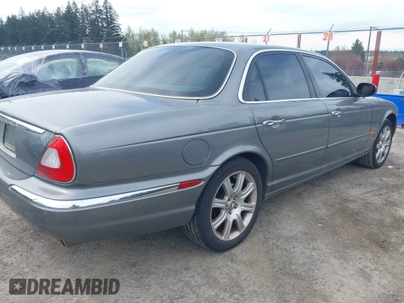 2004 Jaguar XJ with VIN SAJEA74C94SG10199, listed as a IAAI auction lot 42007186 with 138,807 mi miles and . Bid and sale history available at DreamBid. Image 6.