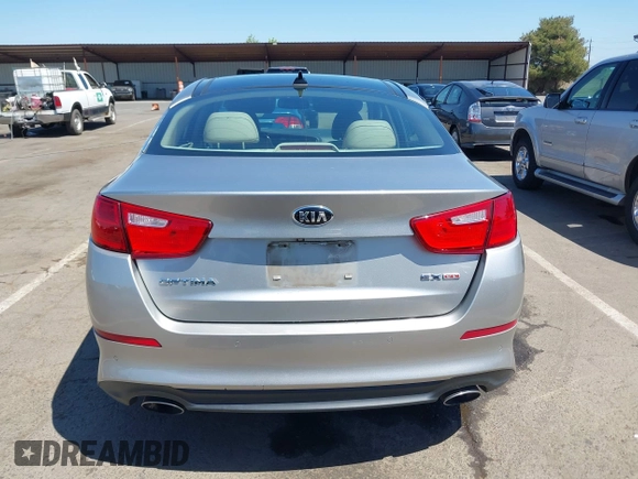 2014 Kia Optima EX with VIN 5XXGN4A75EG317958, listed as a IAAI auction lot 42075557 with 138,903 mi miles and . Bid and sale history available at carsss.com. Image 16.