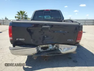 2000 Ford F-150 XL with VIN 1FTRX17L0YKA29295, listed as a Copart auction lot 50719525 with 0 mi miles and Salvage Title. Bid and sale history available at carsss.com. Image 6.