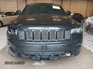 2017 Jeep Grand Cherokee Laredo with VIN 1C4RJFAG3HC841307, listed as a IAAI auction lot 42326035 with 132,655 mi miles and . Bid and sale history available at DreamBid. Image 6.