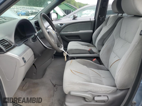 2010 Honda Odyssey LX with VIN 5FNRL3H29AB005111, listed as a Copart auction lot 65005735 with Not provided miles and Clean title. Bid and sale history available at DreamBid. Image 7.
