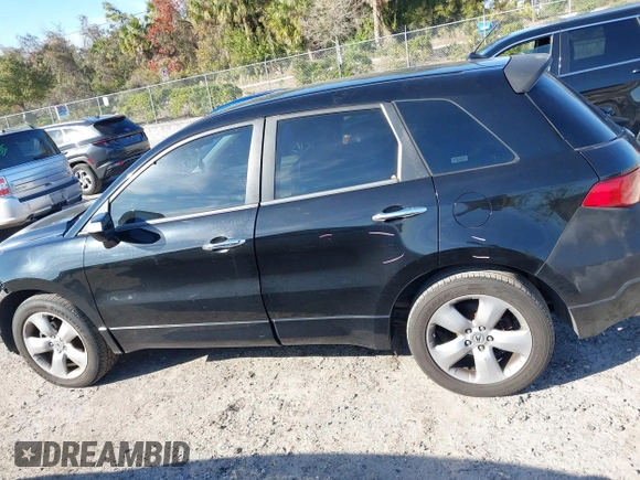 2009 Acura RDX with VIN 5J8TB18249A003141, listed as a IAAI auction lot 41469730 with 180,358 mi miles and . Bid and sale history available at DreamBid. Image 14.