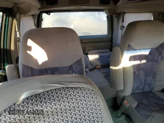 1998 GMC Safari z VIN 1GDDM19W5WB503552, wystawiony jako Copart lot #88247495 z przebiegiem 267 494 mil mil oraz Szkoda całkowita • Salvage title. Historia ofert i sprzedaży dostępna na DreamBid. Obrazek 10.