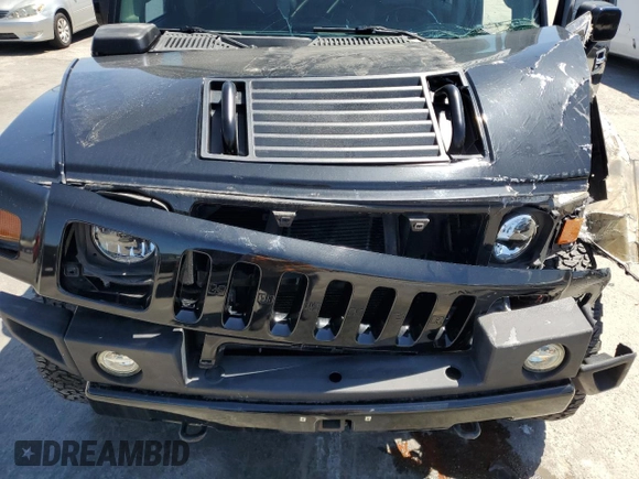 2003 Hummer H2 with VIN 5GRGN23U73H122529, listed as a Copart auction lot 50157934 with 0 mi miles and Salvage Title. Bid and sale history available at carsss.com. Image 11.