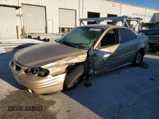 2002 Pontiac Grand Am SE1 z VIN 1G2NF52F52C277574, wystawiony jako Copart lot #82992774 z przebiegiem 242 549 mil mil oraz Szkody całkowita. Historia ofert i sprzedaży dostępna na DreamBid. Obrazek 1.