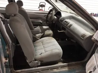 1993 Ford Tempo z VIN 1FAPP31X5PK229656, wystawiony jako IAAI lot #41788568 z przebiegiem 64 620 mil mil oraz . Historia ofert i sprzedaży dostępna na DreamBid. Obrazek 5.