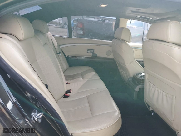 2006 BMW 7 Series 750Li with VIN WBAHN83566DT32047, listed as a Copart auction lot 49974585 with 0 mi miles and Salvage Title. Bid and sale history available at carsss.com. Image 10.