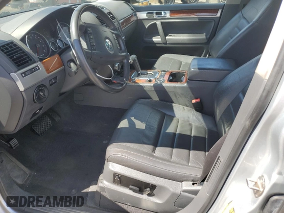 2010 Volkswagen Touareg VR6 with VIN WVGBF7A97AD004355, listed as a Copart auction lot 52861335 with 129,454 mi miles and Salvage Title. Bid and sale history available at DreamBid. Image 7.