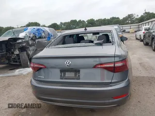 2020 Volkswagen Jetta S z VIN 3VWCB7BU7LM030563, wystawiony jako IAAI lot #42136203 z przebiegiem 52 649 mil mil oraz . Historia ofert i sprzedaży dostępna na DreamBid. Obrazek 16.