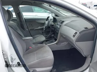 2009 Toyota Corolla with VIN 1NXBU40E99Z082845, listed as a IAAI auction lot 42046564 with 180,910 mi miles. Bid and sale history available at carsss.com. Image 5.