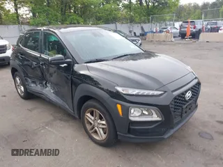 2021 Hyundai Kona SE z VIN KM8K1CAA4MU746136, wystawiony jako IAAI lot #42254642 z przebiegiem 53 939 mil mil oraz . Historia ofert i sprzedaży dostępna na DreamBid. Obrazek 1.