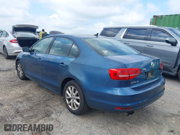 2015 Volkswagen Jetta SE z VIN 3VWD17AJ3FM343189, wystawiony jako IAAI lot #42637957 z przebiegiem 167 747 mil mil oraz . Historia ofert i sprzedaży dostępna na DreamBid. Obrazek 3.