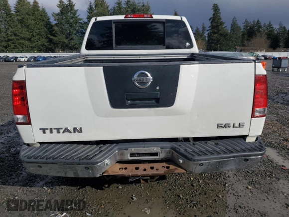 2006 Nissan Titan LE z VIN 1N6AA07B66N556878, wystawiony jako Copart lot #47880935 z przebiegiem 221 371 mil mil oraz Szkoda całkowita • Salvage title. Historia ofert i sprzedaży dostępna na DreamBid. Obrazek 6.