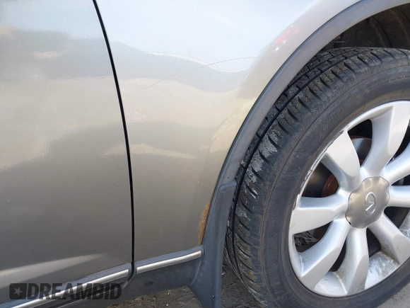 2004 Infiniti FX with VIN JNRBS08W94X404200, listed as a IAAI auction lot 41780095 with 148,802 mi miles. Bid and sale history available at carsss.com. Image 12.