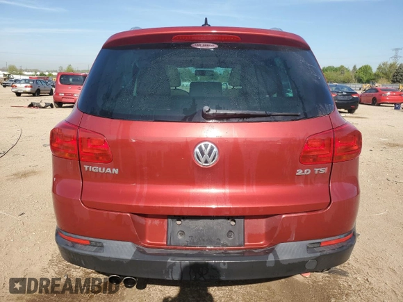 2014 Volkswagen Tiguan SE with VIN WVGAV3AX9EW038118, listed as a Copart auction lot 56329625 with 134,620 mi miles and Salvage title. Bid and sale history available at DreamBid. Image 6.