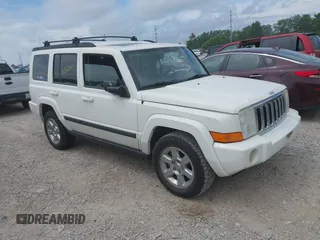2007 Jeep Commander Sport z VIN 1J8HG48KX7C584839, wystawiony jako IAAI lot #42763901 z przebiegiem 174 278 mil mil oraz . Historia ofert i sprzedaży dostępna na DreamBid. Obrazek 1.