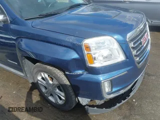 2017 GMC Terrain SLT z VIN 2GKFLPE39H6214358, wystawiony jako IAAI lot #41611688 z przebiegiem 75 012 mil mil oraz . Historia ofert i sprzedaży dostępna na DreamBid. Obrazek 18.
