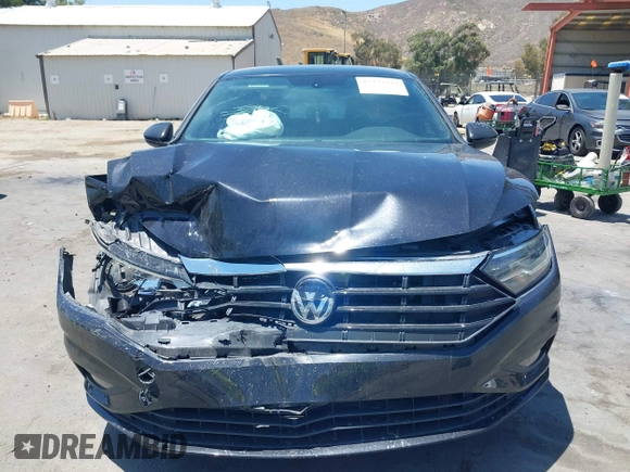 2019 Volkswagen Jetta S z VIN 3VWC57BU1KM116991, wystawiony jako IAAI lot #42377777 z przebiegiem 70 910 mil mil oraz . Historia ofert i sprzedaży dostępna na DreamBid. Obrazek 12.