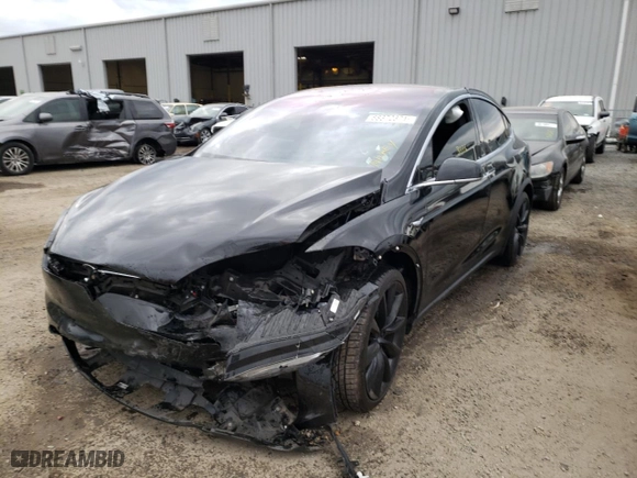 2020 Tesla Model X Long Range with VIN 5YJXCDE23LF231097, listed as a Copart auction lot 68372371 with 31176 miles. Bid and sale history available at carsss.com. Image 2.