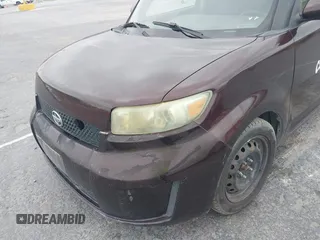 2009 Scion xB with VIN JTLKE50E291081243, listed as a IAAI auction lot 42033327 with 263,903 mi miles. Bid and sale history available at carsss.com. Image 6.