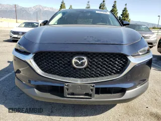 2020 Mazda CX-30 Premium with VIN 3MVDMAEM2LM134841, listed as a Copart auction lot 51979355 with 48,926 mi miles and Salvage title. Bid and sale history available at DreamBid. Image 5.