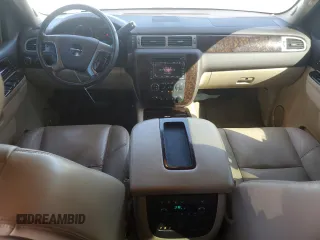 2011 GMC Yukon Denali with VIN 1GKS1EEFXBR121055, listed as a Copart auction lot 77194354 with 98,806 mi miles and Salvage Title. Bid and sale history available at carsss.com. Image 8.