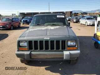 2000 Jeep Cherokee with VIN 1J4FF48S0YL198802, listed as a Copart auction lot 59996915 with 249,756 mi miles and Salvage title. Bid and sale history available at DreamBid. Image 5.