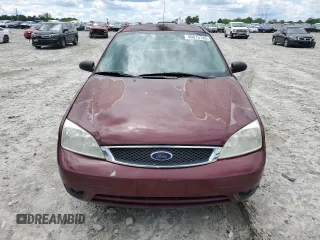 2006 Ford Focus S z VIN 1FAFP34N36W171785, wystawiony jako Copart lot #55815195 z przebiegiem 164 074 mil mil oraz Szkoda całkowita • Salvage title. Historia ofert i sprzedaży dostępna na DreamBid. Obrazek 5.