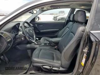 2011 BMW 1 Series 128i with VIN WBAUP7C5XBVM54479, listed as a Copart auction lot 66010505 with 133,535 mi miles and Clean title. Bid and sale history available at DreamBid. Image 7.