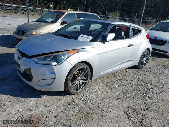 2012 Hyundai Veloster w/Gray Int with VIN KMHTC6AD8CU023009, listed as a IAAI auction lot 41668766 with 132,006 mi miles. Bid and sale history available at carsss.com. Image 2.