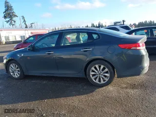 2016 Kia Optima EX with VIN 5XXGU4L33GG010286, listed as a IAAI auction lot 41669758 with 111,713 mi miles. Bid and sale history available at carsss.com. Image 14.