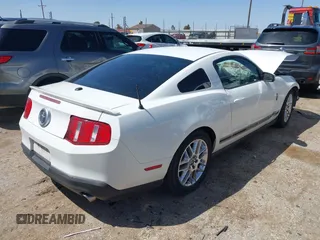 2012 Ford Mustang V6 Premium with VIN 1ZVBP8AM7C5263479, listed as a IAAI auction lot 41968713 with 148,144 mi miles. Bid and sale history available at carsss.com. Image 4.