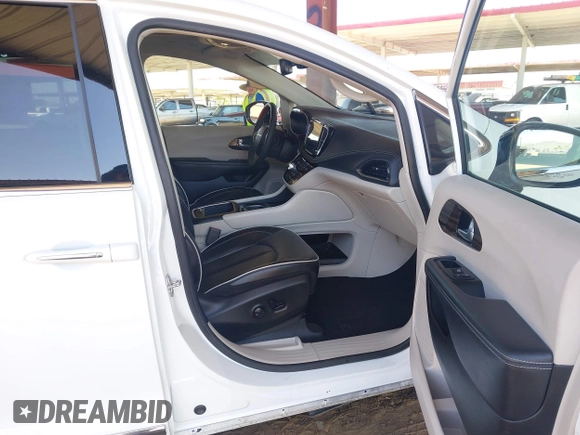 2023 Chrysler Pacifica Limited with VIN 2C4RC1GG6PR533414, listed as a IAAI auction lot 42455618 with 53,834 mi miles and . Bid and sale history available at DreamBid. Image 5.