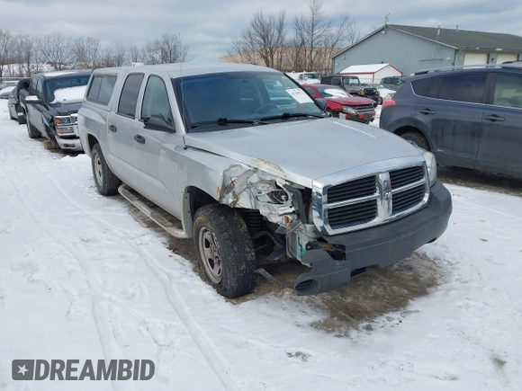 2006 Dodge Dakota ST with VIN 1D7HE28K56S636387, listed as a IAAI auction lot 41305723 with 104,821 mi miles and . Bid and sale history available at carsss.com. Image 1.