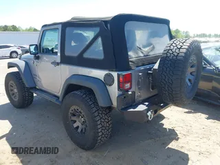 2015 Jeep Wrangler Sport with VIN 1C4AJWAG3FL696988, listed as a IAAI auction lot 41999036 with 79,064 mi miles. Bid and sale history available at carsss.com. Image 3.