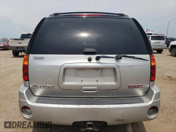 2004 GMC Envoy SLT with VIN 1GKDT13S842439635, listed as a Copart auction lot 63317194 with 201,672 mi miles and Salvage Title. Bid and sale history available at carsss.com. Image 6.