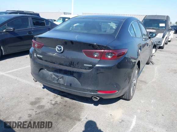2021 Mazda 3 Select with VIN 3MZBPABL2MM250695, listed as a IAAI auction lot 42001485 with 29,672 mi miles and . Bid and sale history available at DreamBid. Image 4.