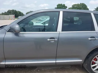 2005 Porsche Cayenne Turbo z VIN WP1AC29P25LA90019, wystawiony jako IAAI lot #42295764 z przebiegiem 164 927 mil mil oraz . Historia ofert i sprzedaży dostępna na DreamBid. Obrazek 14.
