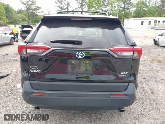 2021 Toyota RAV4 Hybrid XLE with VIN JTMRWRFV2MD133113, listed as a IAAI auction lot 42087394 with 103,019 mi miles and . Bid and sale history available at DreamBid. Image 16.