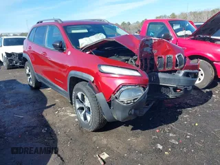2014 Jeep Cherokee Trailhawk z VIN 1C4PJMBS0EW257133, wystawiony jako IAAI lot #41446095 z przebiegiem 82 285 mil mil oraz . Historia ofert i sprzedaży dostępna na DreamBid. Obrazek 1.