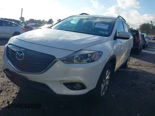 2015 Mazda CX-9 Touring with VIN JM3TB3CV0F0465622, listed as a IAAI auction lot 40955697 with 29,792 mi miles. Bid and sale history available at carsss.com. Image 6.