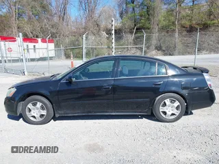 2003 Nissan Altima S with VIN 1N4AL11D33C320084, listed as a IAAI auction lot 41849903 with 212,137 mi miles. Bid and sale history available at carsss.com. Image 14.