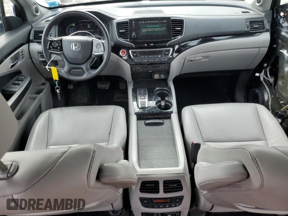 2020 Honda Pilot Touring 7-Passenger with VIN 5FNYF6H60LB039609, listed as a Copart auction lot 51753425 with 57,512 mi miles and Salvage title. Bid and sale history available at DreamBid. Image 8.