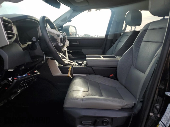 2023 Toyota Tundra Limited with VIN 5TFJA5DB9PX069197, listed as a Copart auction lot 52006175 with 7,396 mi miles and Salvage title. Bid and sale history available at DreamBid. Image 7.