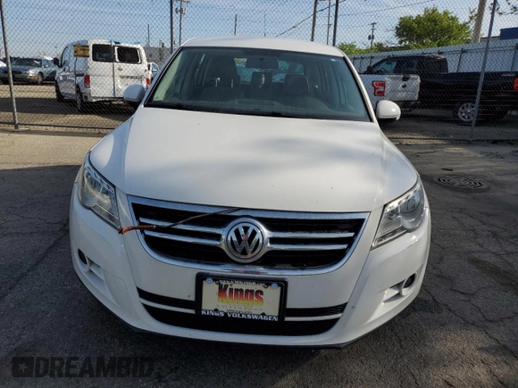 2011 Volkswagen Tiguan SE with VIN WVGBV7AX6BW525168, listed as a Copart auction lot 53824915 with 113,628 mi miles and Salvage Title. Bid and sale history available at DreamBid. Image 5.