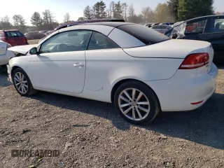 2015 Volkswagen Eos Komfort with VIN WVWBW8AH1FV000692, listed as a Copart auction lot 77866694 with 114,156 mi miles and Salvage Title. Bid and sale history available at DreamBid. Image 2.