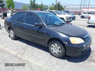 2003 Honda Civic LX z VIN 2HGES16513H563861, wystawiony jako IAAI lot #42317526 z przebiegiem 219 916 mil mil oraz . Historia ofert i sprzedaży dostępna na DreamBid. Obrazek 1.