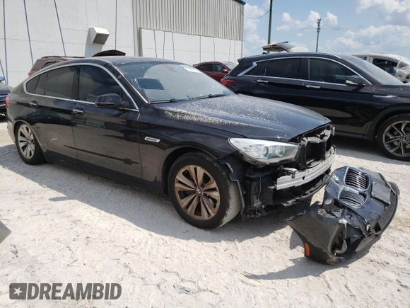 2017 BMW 5 Series with VIN WBA5M2C31HG499368, listed as a Copart auction lot 52301314 with 71,317 mi miles and . Bid and sale history available at DreamBid. Image 4.